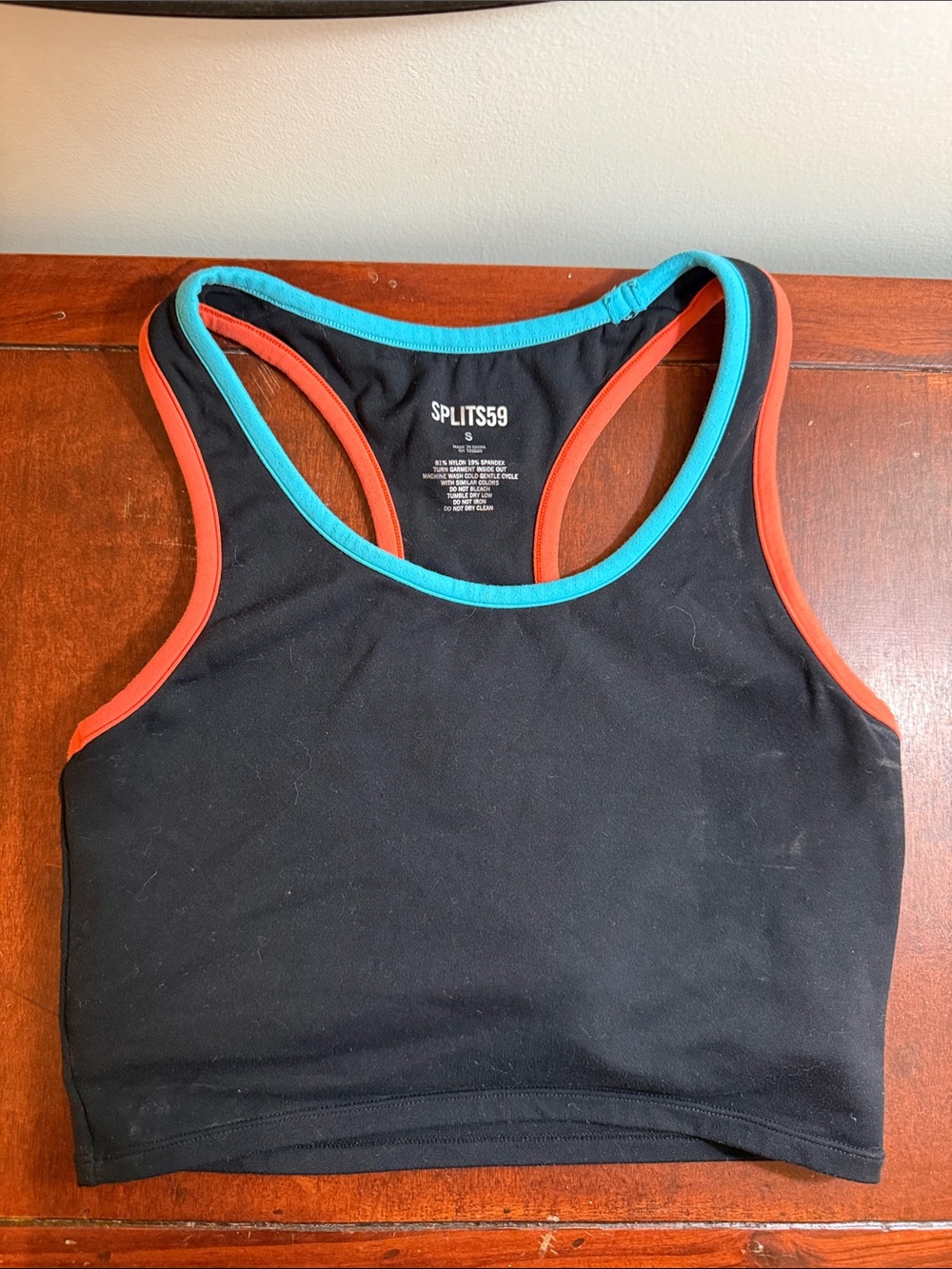 SPLITS59 Black Racerback Crop Tank with Teal and Coral Trim